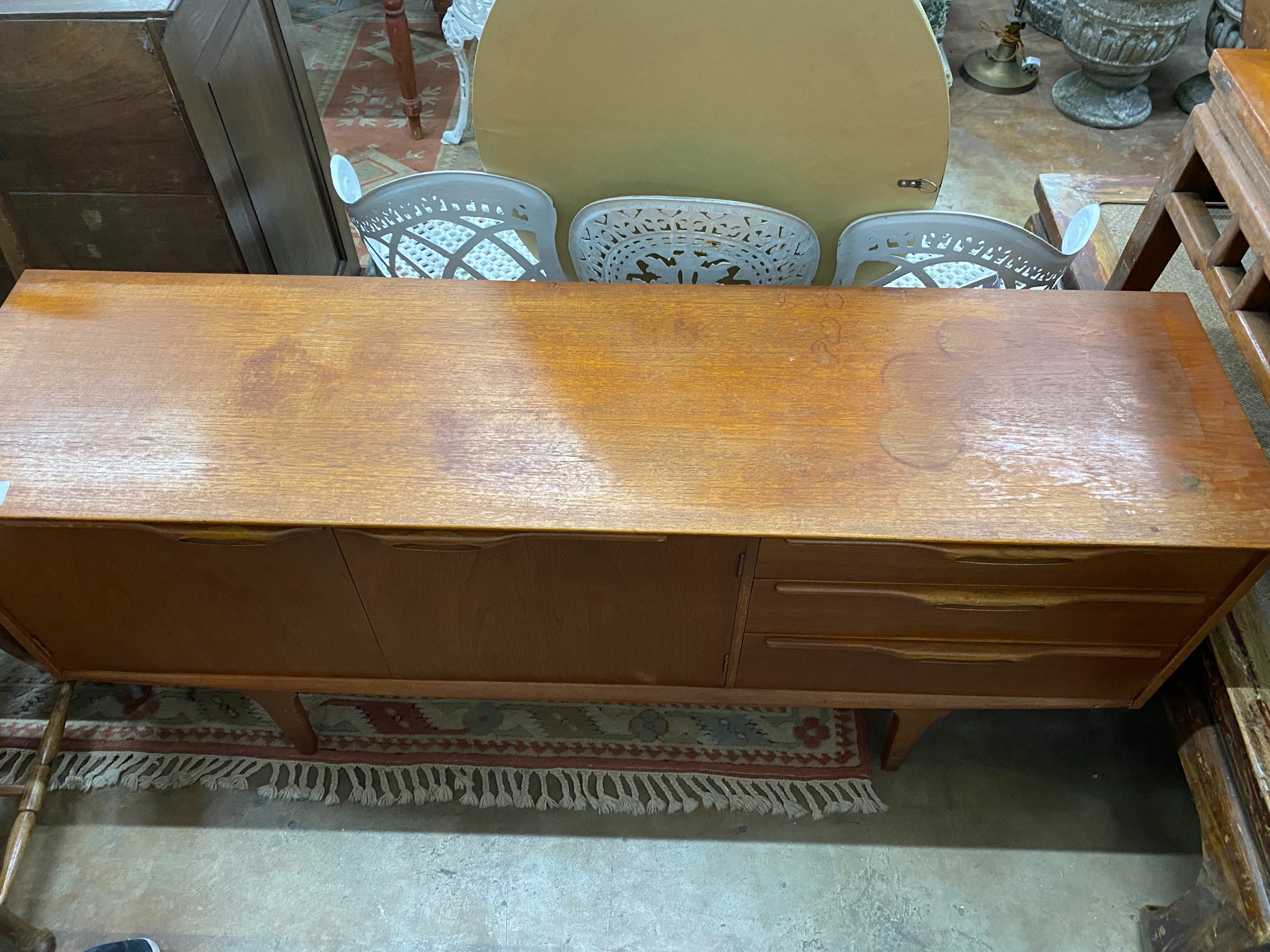 A mid century teak sideboard, length 168cm, depth 45cm, height 74cm